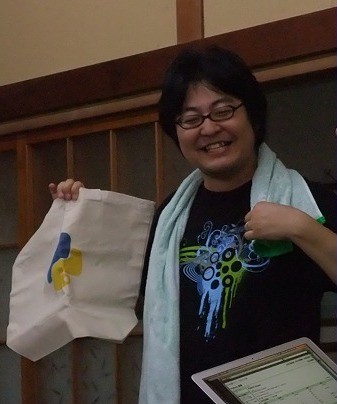 Ryosuke giving away goods at PySpa